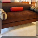 F40. Upholstered ultra suede bench. 22”h x 65”w x 23”d 